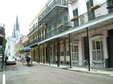 Horse drawn cariage and balconies on Royal Street