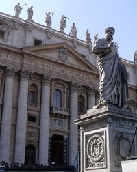 Saint Peter's Basilica in Rome. The statue in the foreground is of Saint Peter, held by the Roman Catholic Church to be the first Pope.