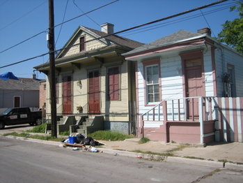 Old homes in Treme. Front stoops display high water line from Hurricane Katrina flooding in this October, 2005 photo.