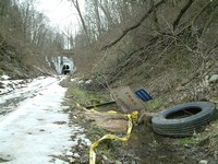 Tire and fallen sign