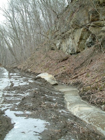 Ditch blocked by large rock