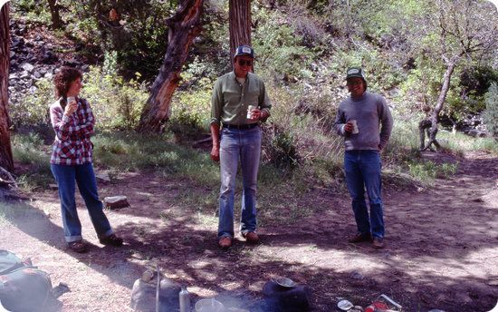 Betsy drinking Coors with backpackers in the Black Canyon of the Gunnison  - May of 1982